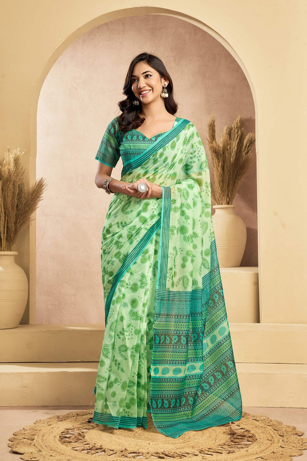 Green printed linen ready-to-wear saree with matching unstitched blouse piece