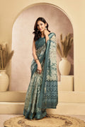Sage gree printed linen saree in a ready-to-wear style with unstitched blouse material