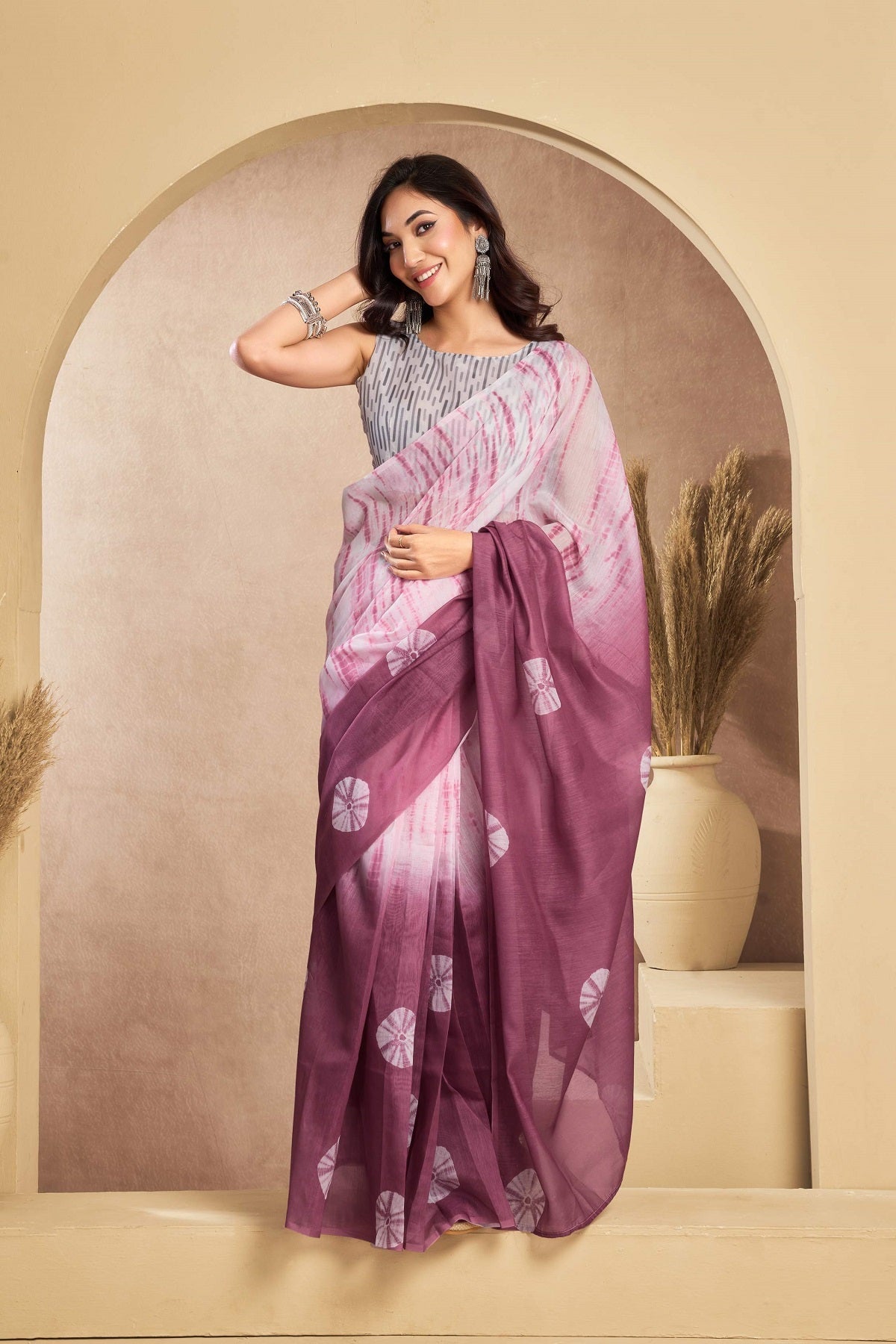 Baby pink printed ready-to-wear linen saree with an unstitched blouse piece