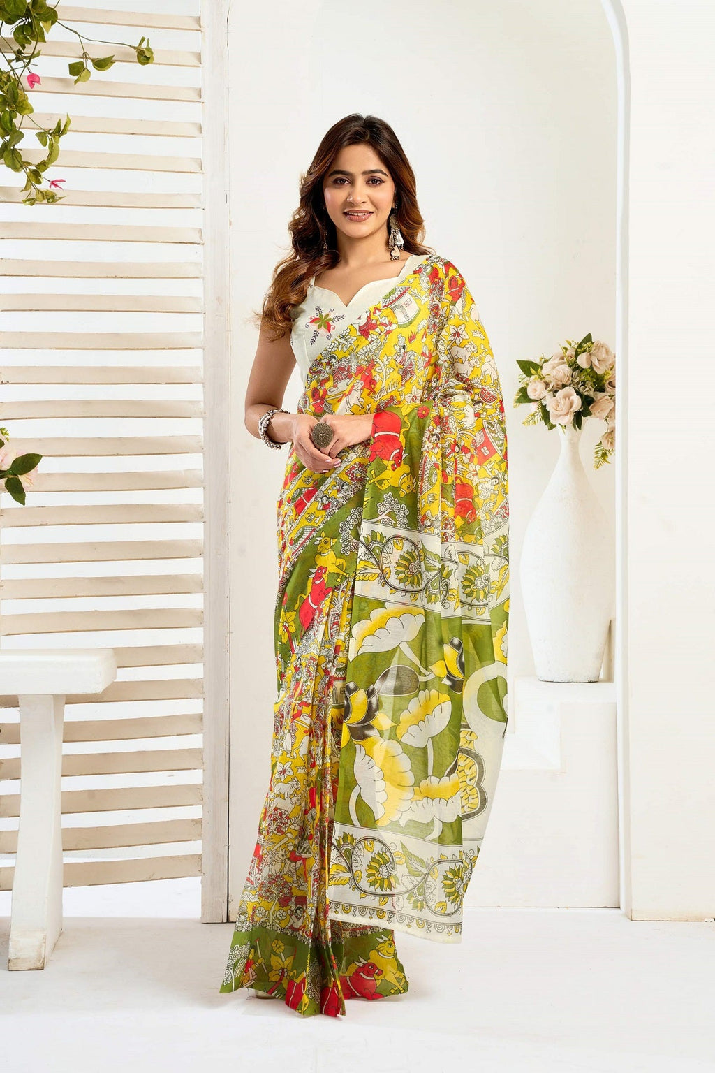 Yellow printed linen ready-to-wear saree with matching unstitched blouse