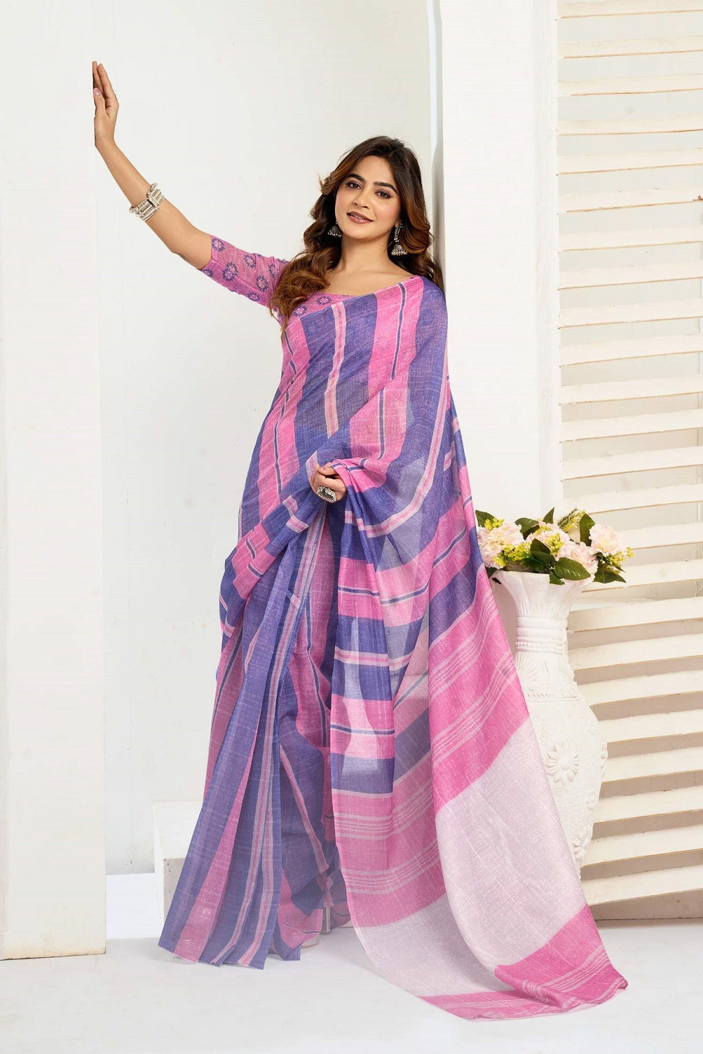 Pink printed linen ready-to-wear saree with matching unstitched blouse fabric