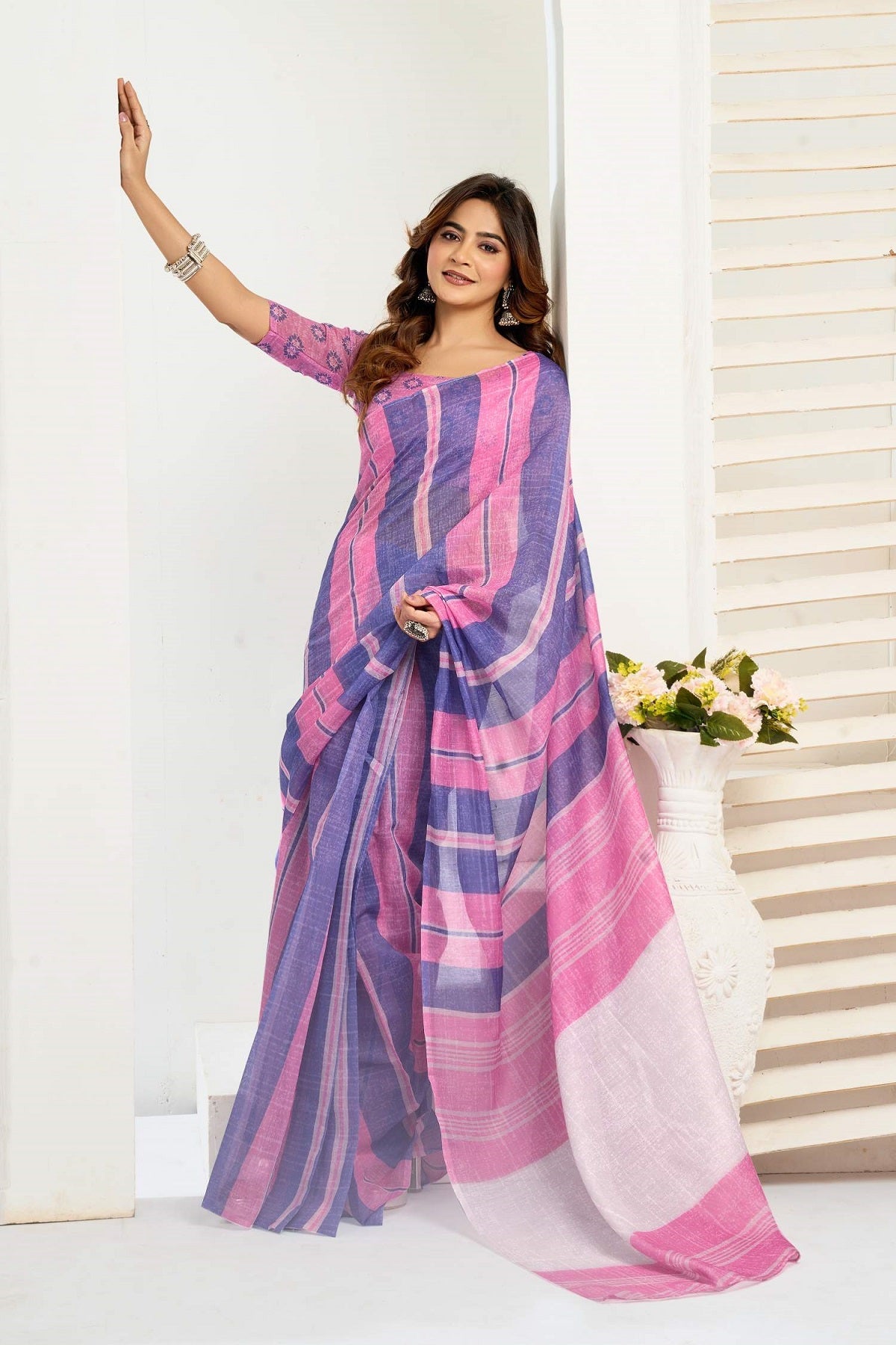 Pink printed linen ready-to-wear saree with matching unstitched blouse fabric