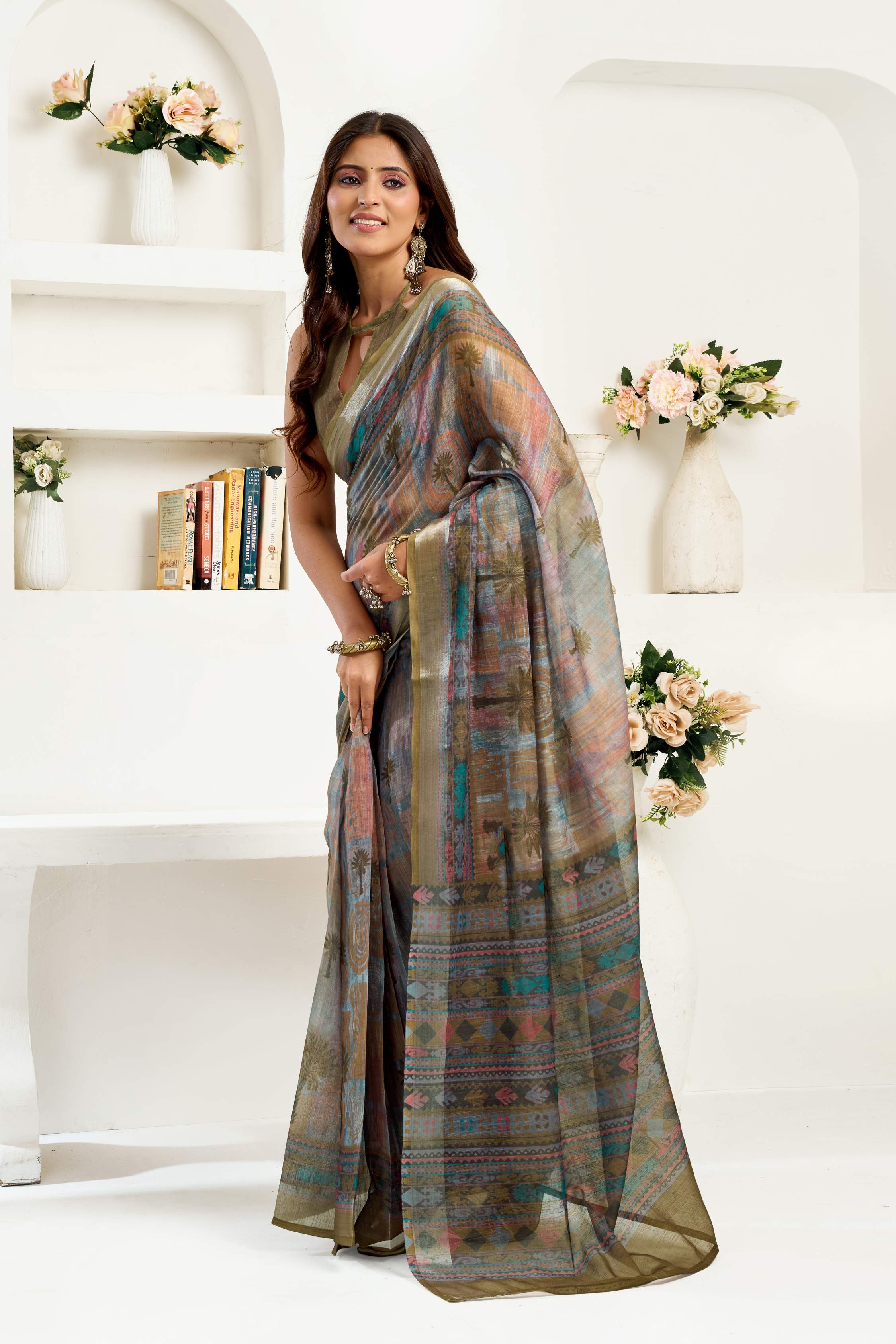 Sage green printed linen ready-to-wear saree with matching unstitched blouse fabric
