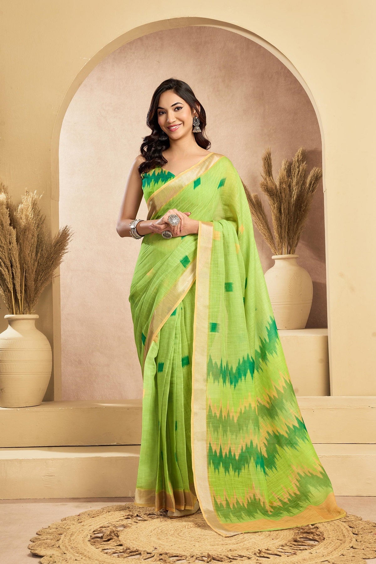 Elegant mint green printed linen saree in a ready-to-wear design