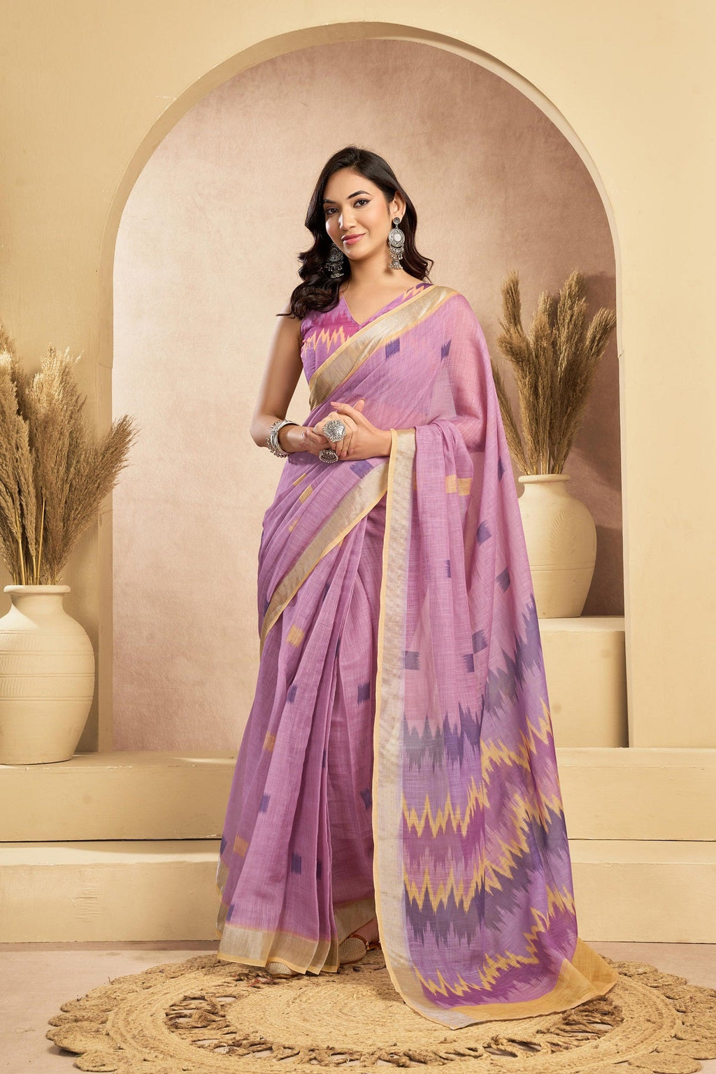 Dusky pink printed linen ready-to-wear saree with matching unstitched blouse fabric