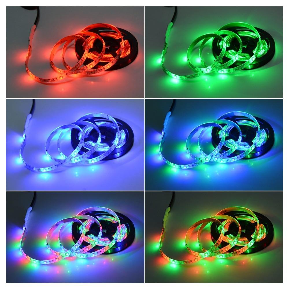 Multicolor RGB LED tape lights illuminating a TV background
