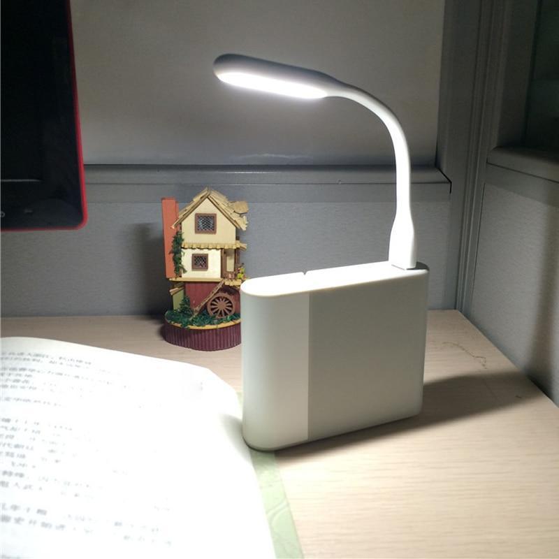 Mini portable USB LED reading light connected to a laptop