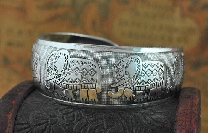 Vintage Tibetan Silver Floral and Animal Motif Cuff Bangle