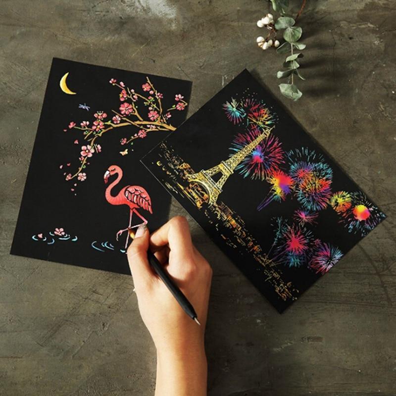 Set of four black magic scratch-off postcards with vibrant multi-colored floral reveal designs