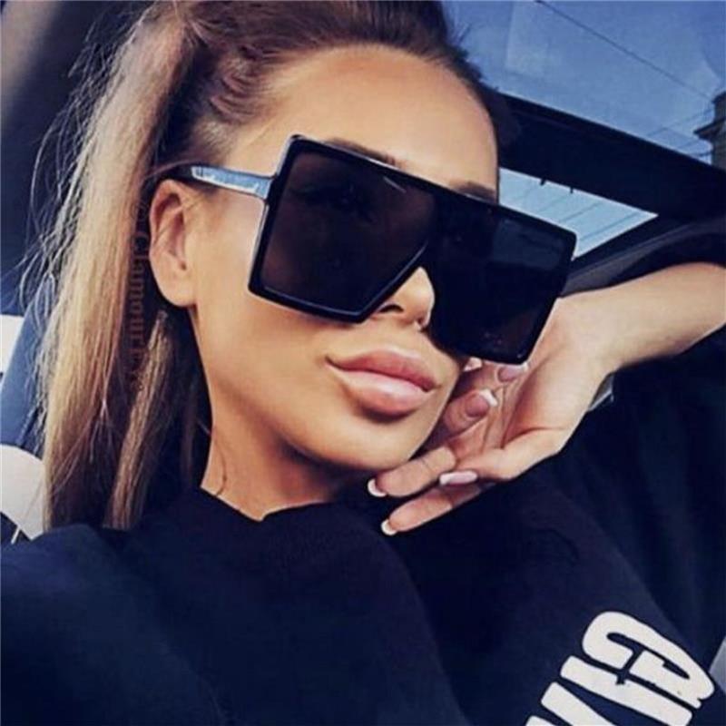 Luxury oversized black square sunglasses for women with a modern, fashion-forward look.