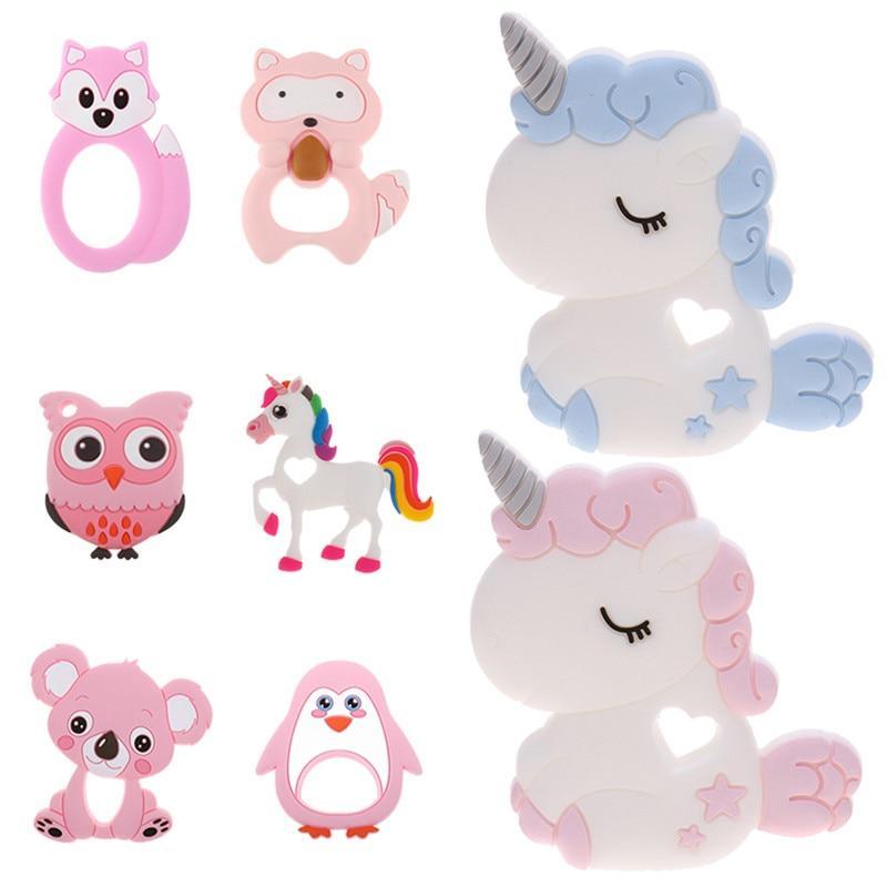 Collection of cartoon animal-shaped silicone teethers including unicorn and koala
