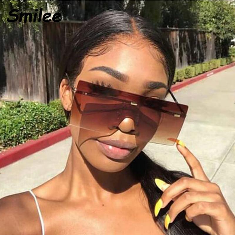 Oversized rimless gradient sunglasses for women with gold-toned metal frames
