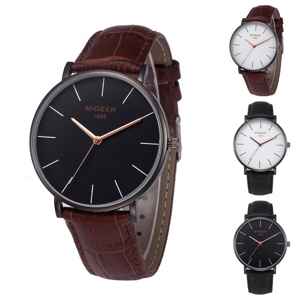 Classic minimalist men's watch with a slim design and leather strap in black, white, and brown options.