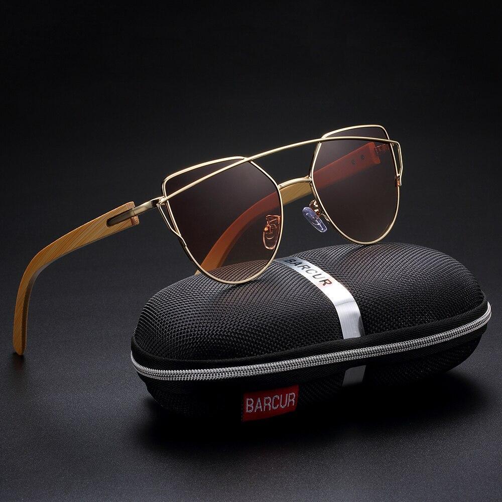 Oversized cat eye sunglasses for women with a metallic silver frame and light bamboo wood detailing.