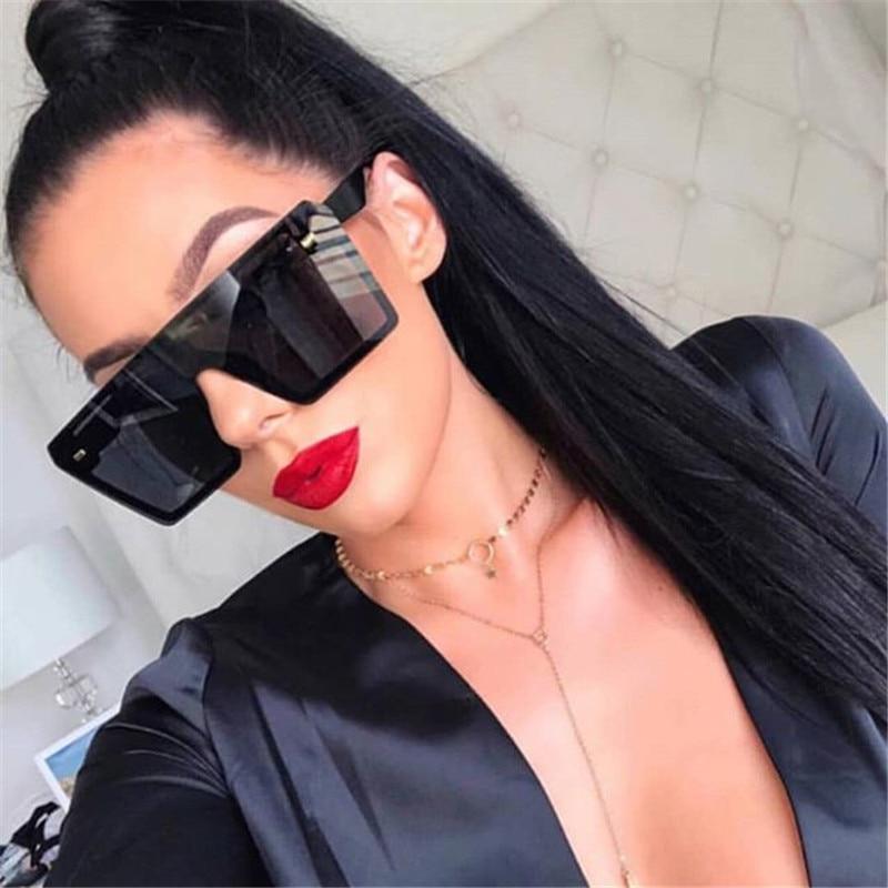 Modern oversized square sunglasses in black, red, and tortoiseshell with mirror lens finish