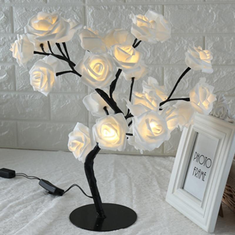 Rose shaped decorative table lamp with matte rose gold finish and double light feature