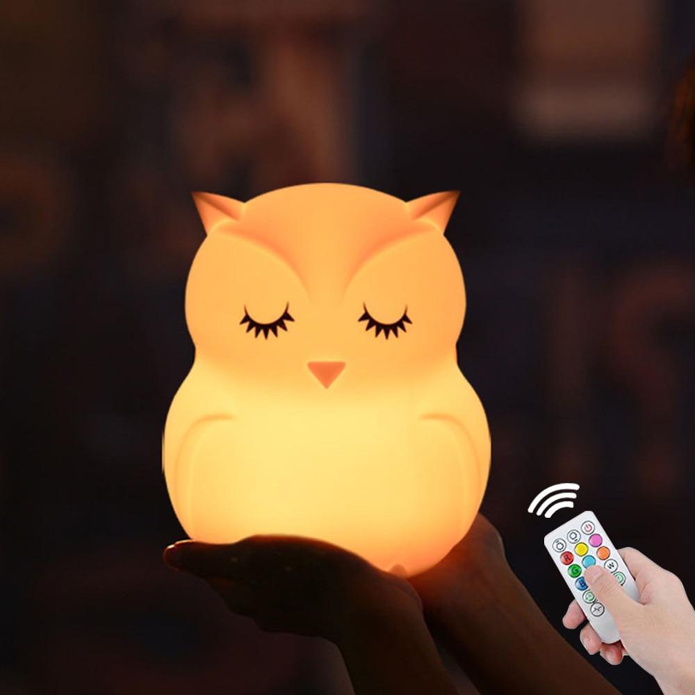 Cute owl-shaped silicone LED night light for kids with remote control and color-changing features.