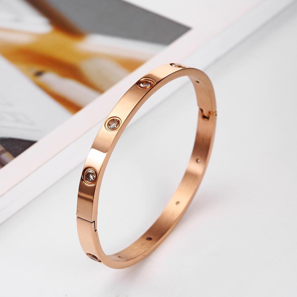 Rose gold stainless steel bangle bracelet with simulated diamond crystals
