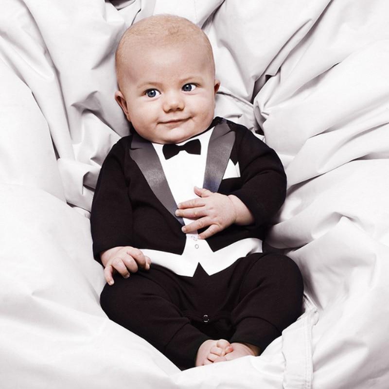 Baby boy wearing a solid color long-sleeved formal cotton romper for special occasions
