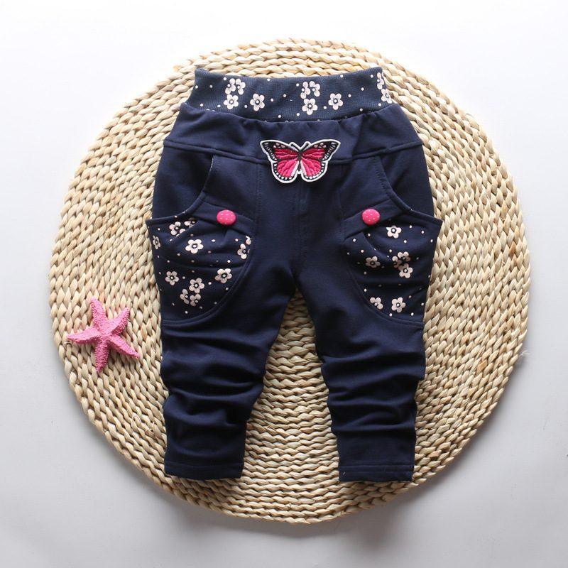 Baby girl navy pants with butterfly embroidery and floral pattern