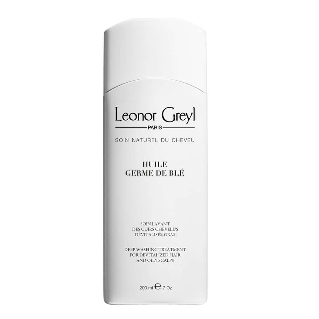 White bottle of Leonor Greyl Huile de Germe de Blé deep washing treatment for hair.