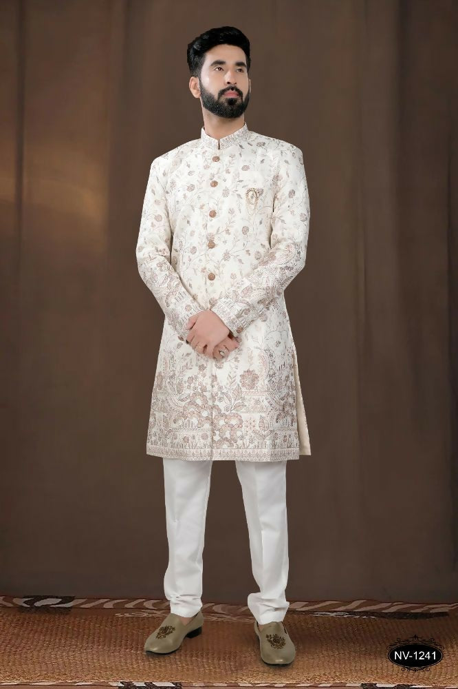 Close-up of base off-white boys kurta featuring thread and sequence embroidery