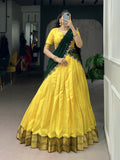 Bright yellow cotton silk lehenga choli with traditional zari weaving work
