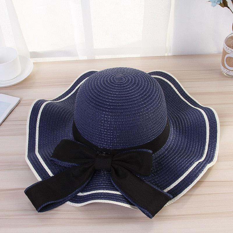 Women's Wide Brim Straw Beach Hat with Luxury Bowknot Detail