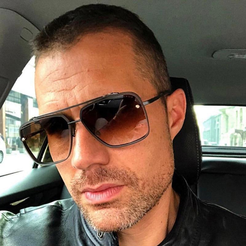 Men wearing vintage design sunglasses in black and gold finish