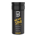 L3VEL3 Hair Wax Stick for precise styling and edge control held in a white twist-up tube.