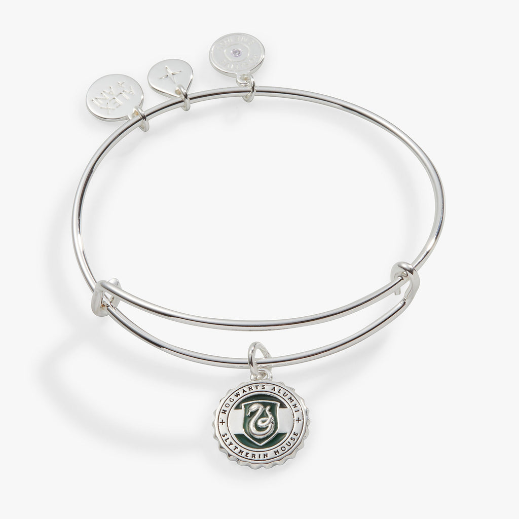Harry Potter Slytherin house charm bangle with a snake emblem and Hogwarts Alumni inscription.