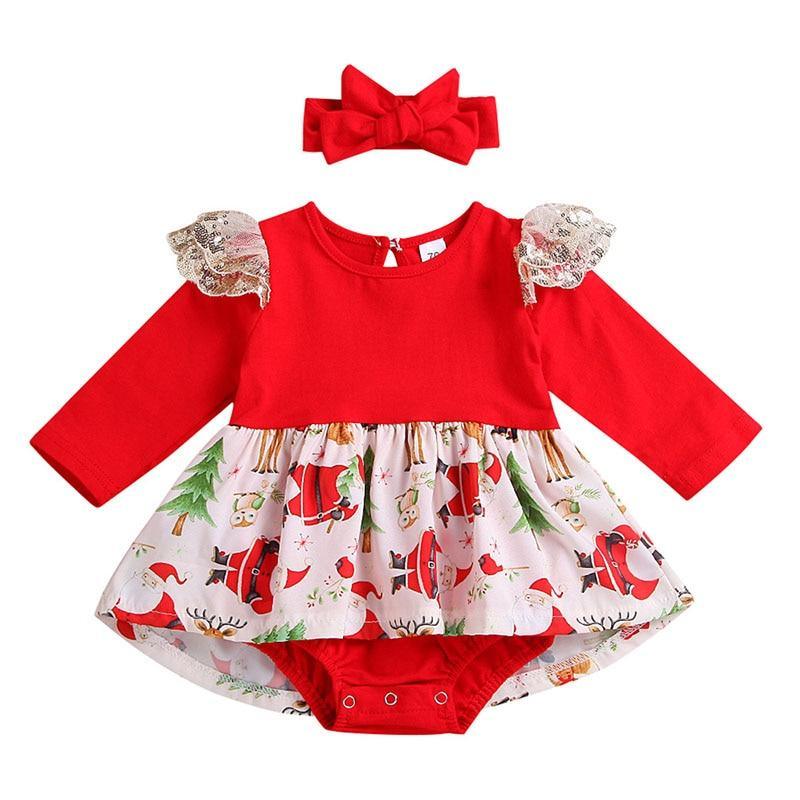Baby girl wearing a red and white long sleeve Christmas ruffle romper dress