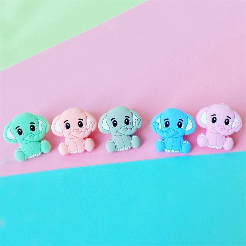 Set of two pastel-colored silicone elephant teethers for babies, textured design for gum relief.