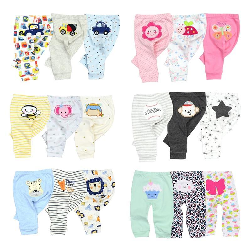 Set of baby cotton pants with cartoon designs and elastic waistbands for newborns and toddlers