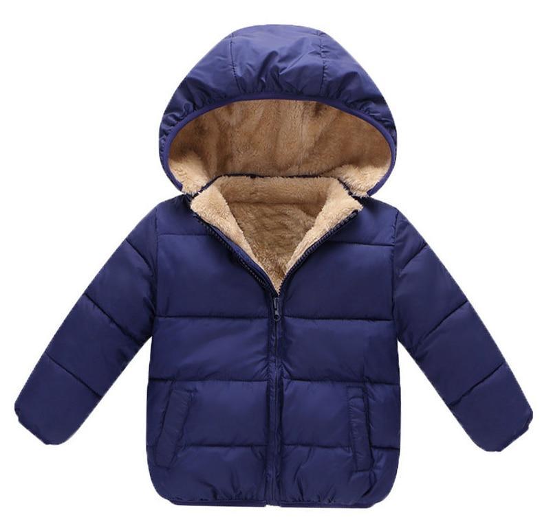 Toddler boy wearing a classic, windproof padded jacket with zipper closure