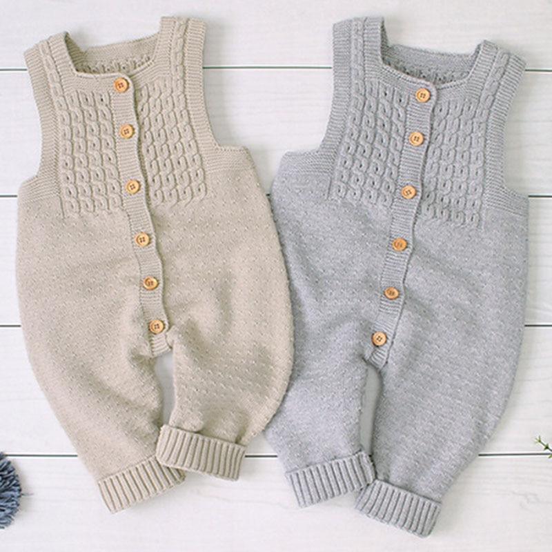 Modern retro style handmade knitted cotton baby romper with front pocket detail