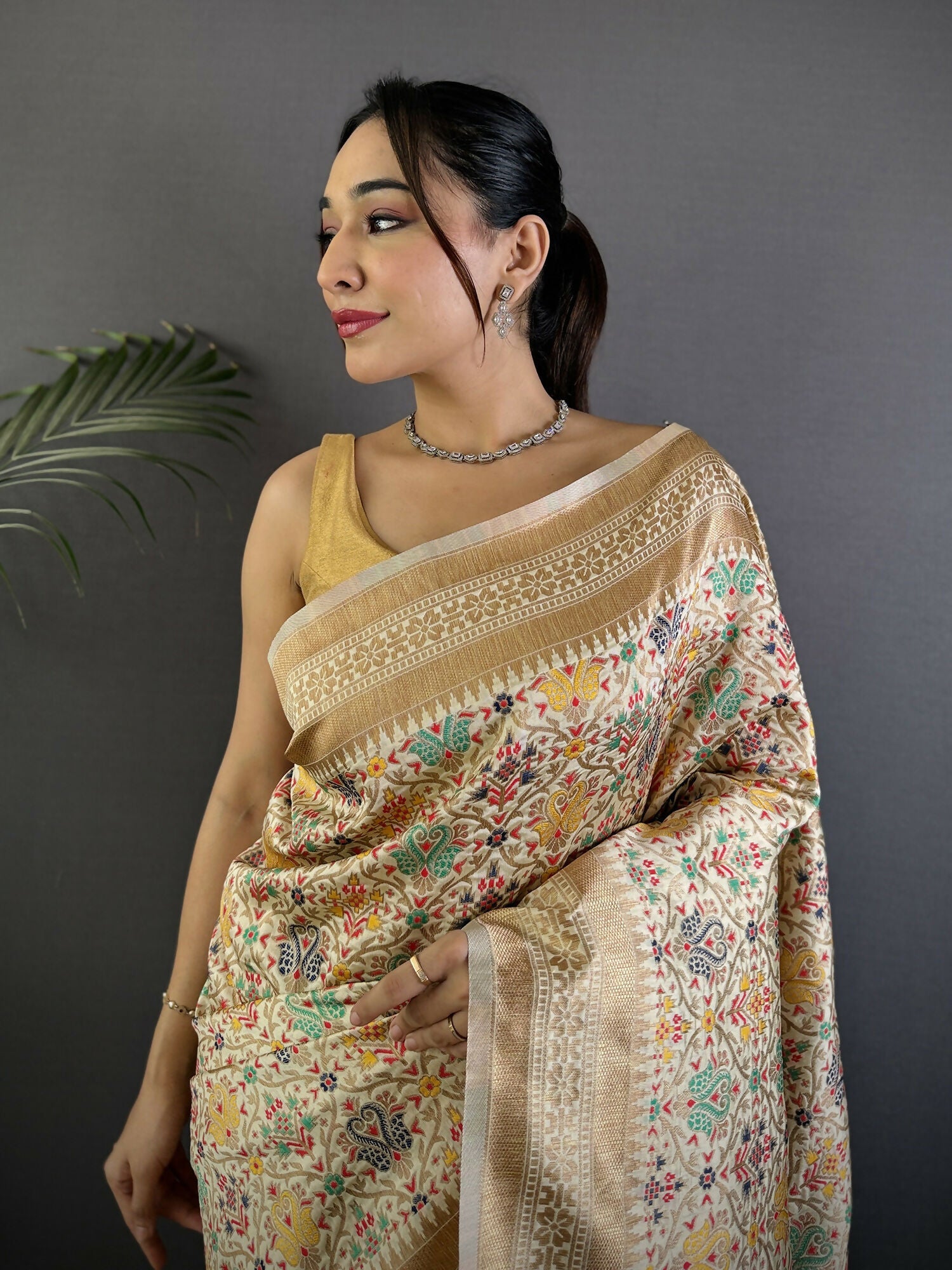 Cream Soft Silk Banarasi Saree with Intricate Floral Woven Motifs