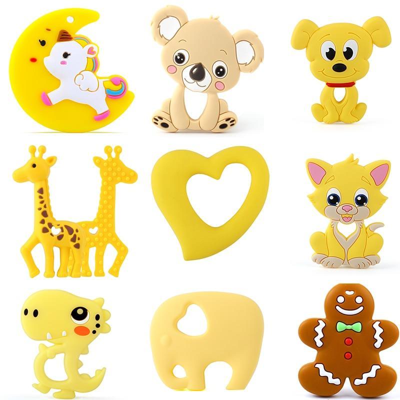 Selection of dog, dinosaur, and koala shaped silicone baby teethers in various colors