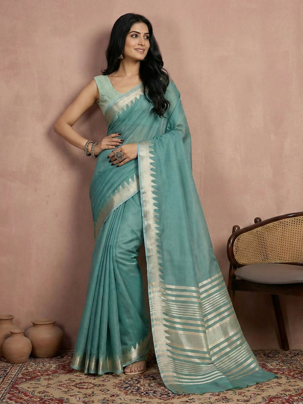 Close up of a deep Teal cotton saree with a matching blouse