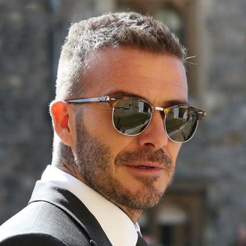 Unisex vintage semi-rimless polarized sunglasses available in black, blue, and gold