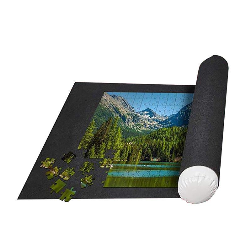 A black roll-up felt puzzle mat with an inflatable tube and storage bag for puzzle organization.