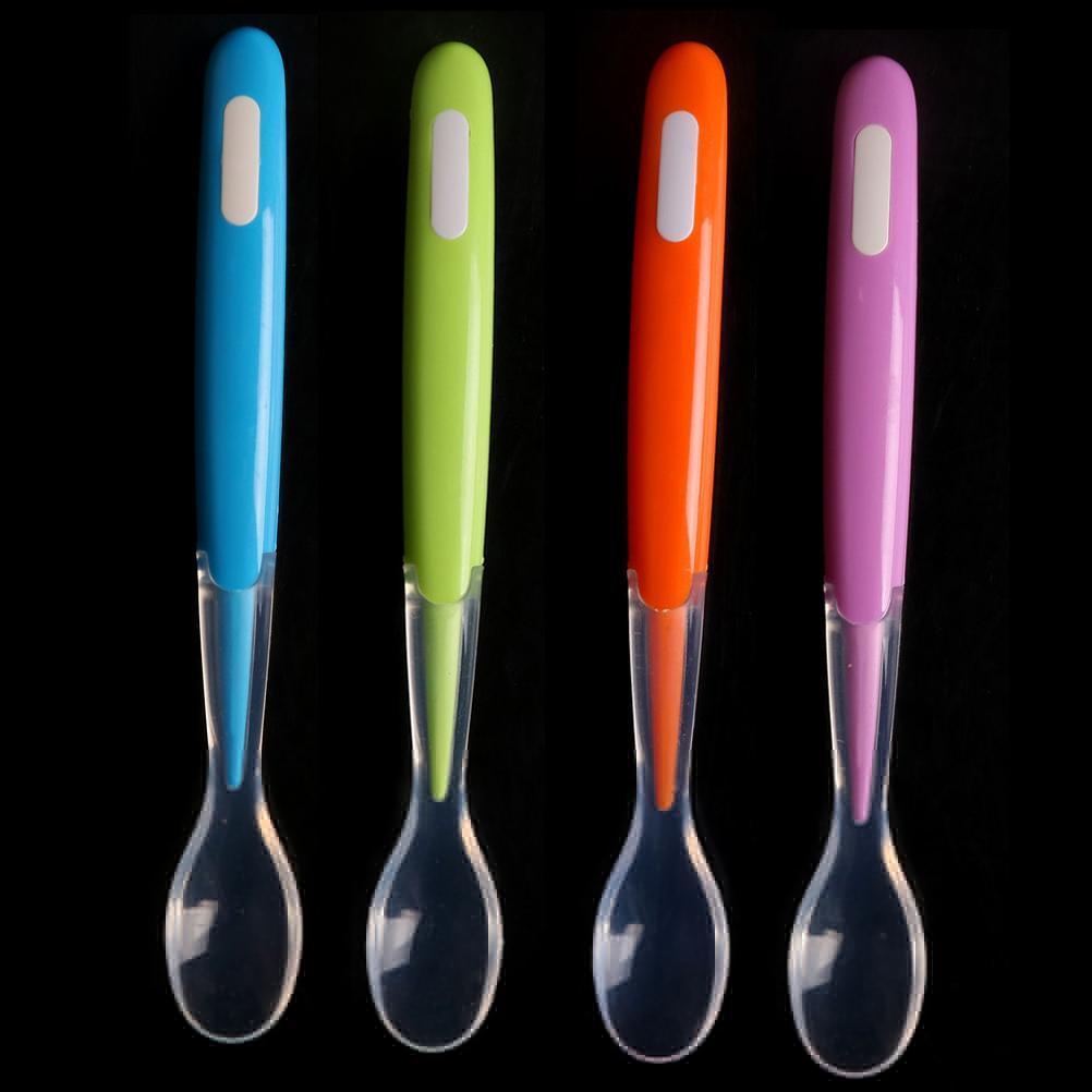 Soft silicone baby training spoon with ergonomic handle for stage-one feeding