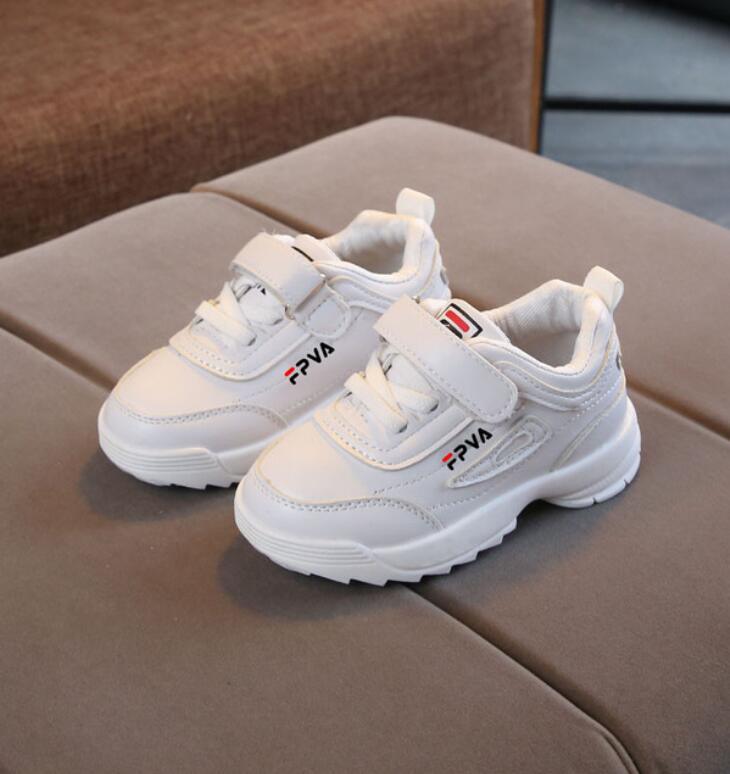 Sporty white and pink leather sneakers for kids with hook and loop closure
