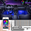 Stevvex RGB LED car strip lights installed in a vehicle dashboard interior with vibrant colors.