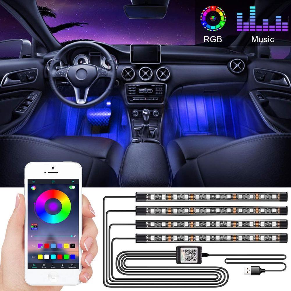 Stevvex RGB LED car strip lights installed in a vehicle dashboard interior with vibrant colors.