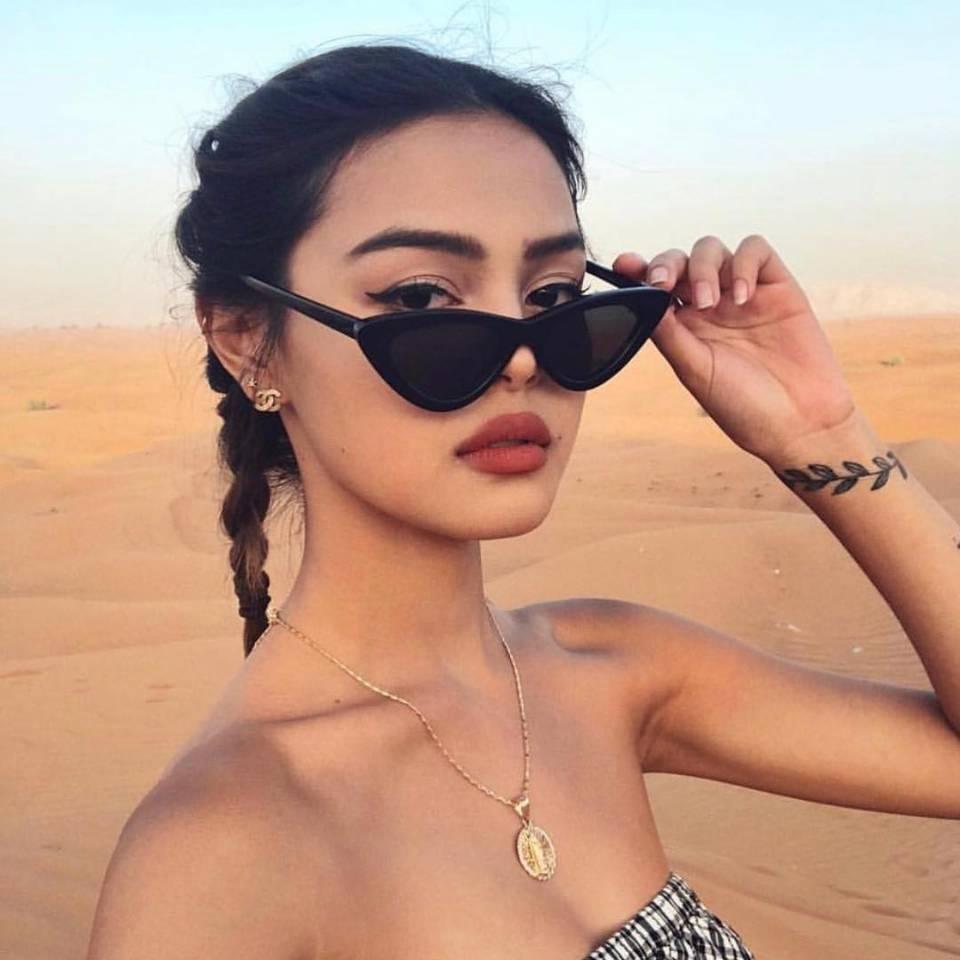 Vintage cat-eye sunglasses for women with modern flash-mirrored lenses.