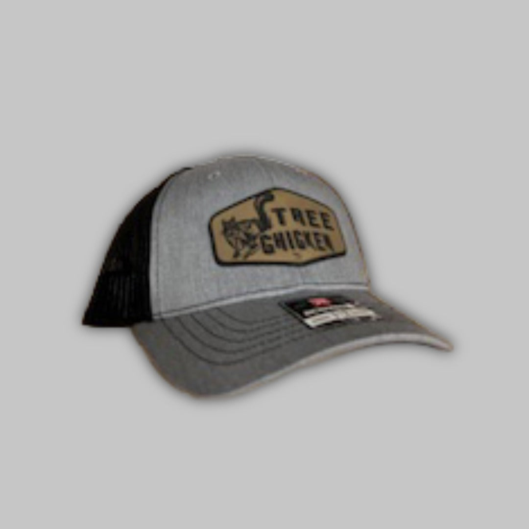 Youth-sized Richardson snapback trucker hat in camo pattern for outdoor sports
