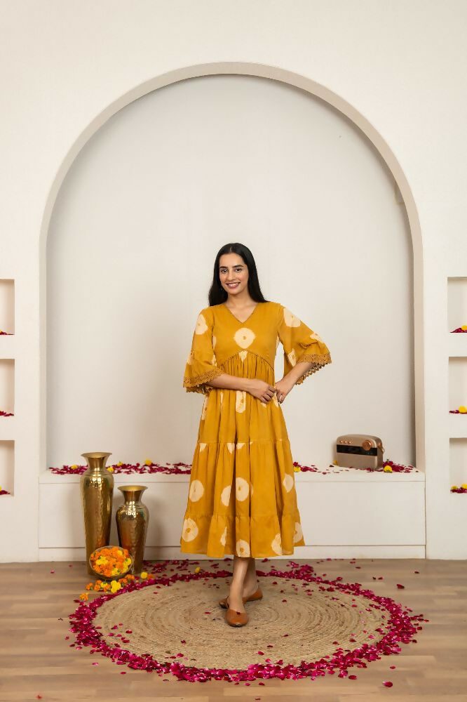 Mustard yellow tie and dye cotton dress with a relaxed silhouette