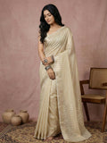 A beautiful cream cotton saree with matching blouse fabric, shown in a clean, elegant drape.