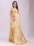 Close up of gold organza fabric saree with yellow blouse material